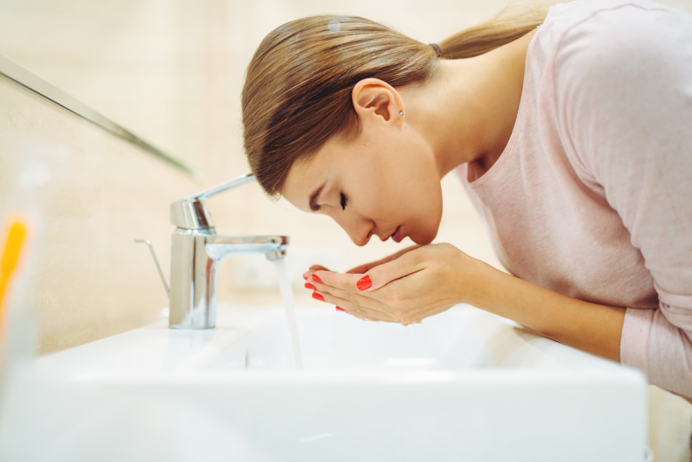 washing face with natural ingredients