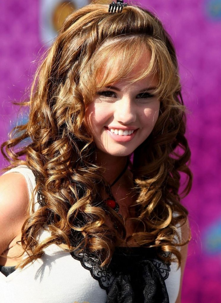 Drop curls spiraled inward to add body to straight hair