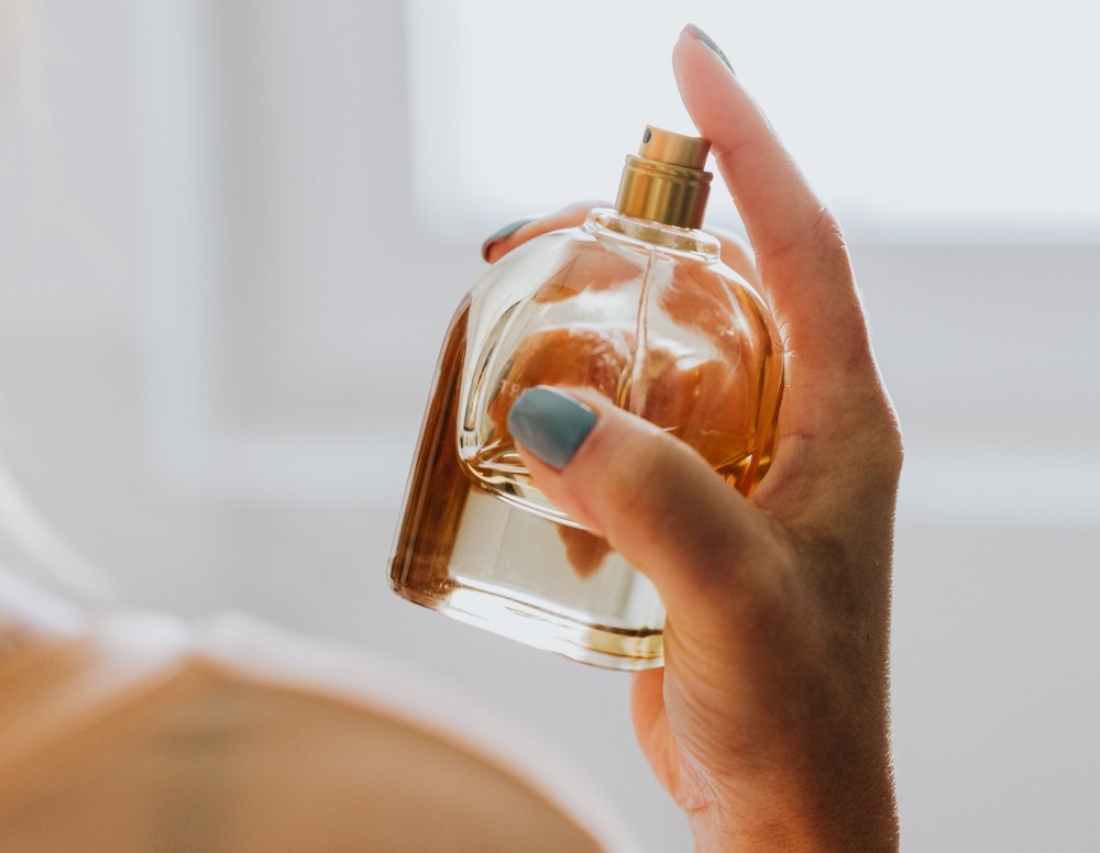 where to spray perfume to last longer