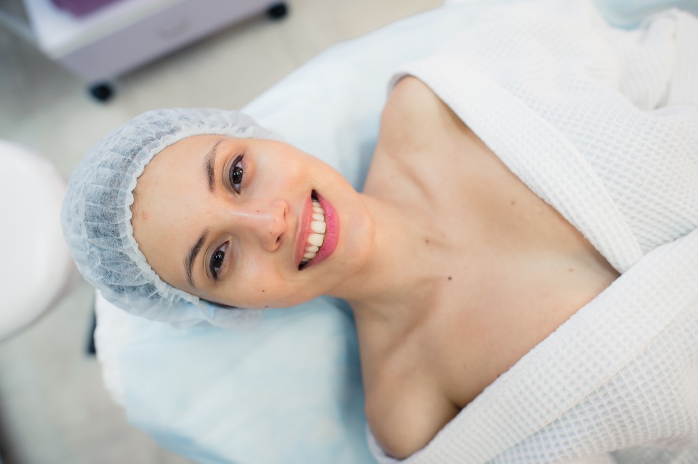 beautiful patient smiling after Anti-Aging Treatments